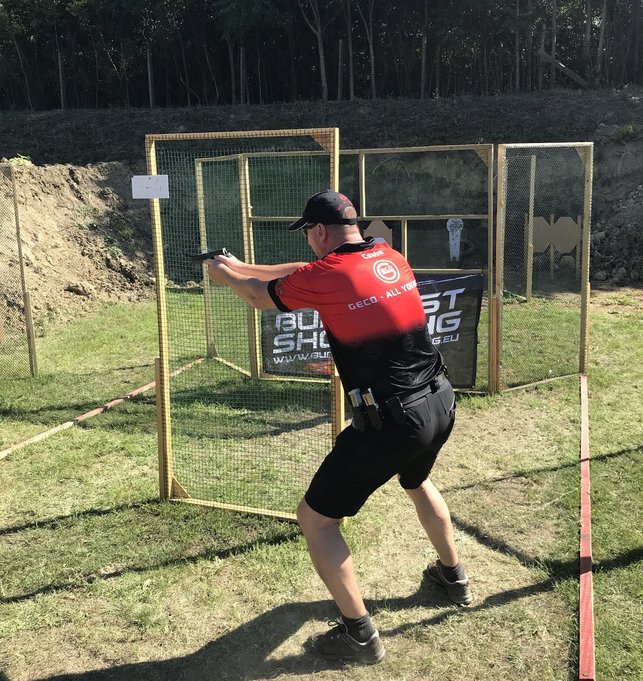 GECO shooter Csaba Szaszi shooting IPSC competition, from behind